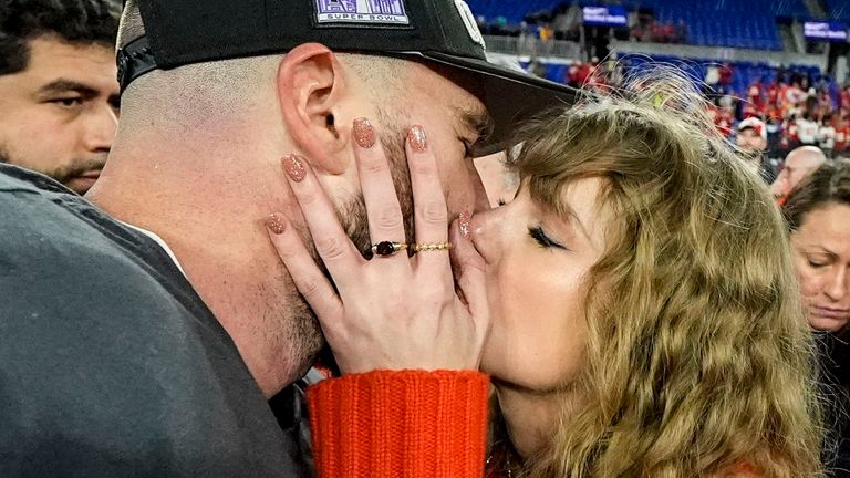 Taylor Swift kisses Travis Kelce, Sunday, Jan. 28, 2024, in Baltimore. Pic: AP Photo/Julio Cortez