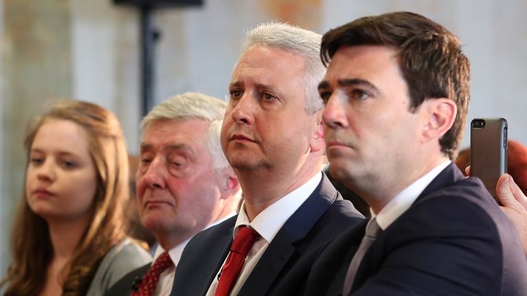 (from second left) Interim mayor Tony Lloyd and Ivan Lewis sit next to Andy Burnham, before he was announced as the Labour candidate who will fight to become the mayor of Greater Manchester in 2016