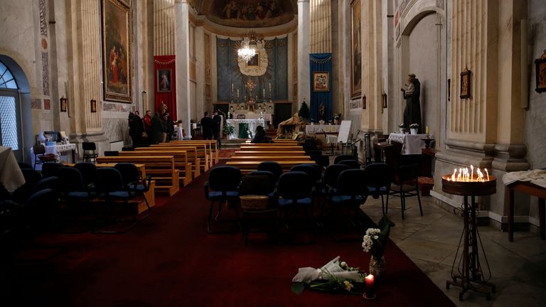 Flowers are placed inside Italian Santa Maria Catholic Church a day after an attack during the Sunday service, in which one person was killed, in Istanbul, Turkey January 29, 2024. REUTERS/Dilara Senkaya