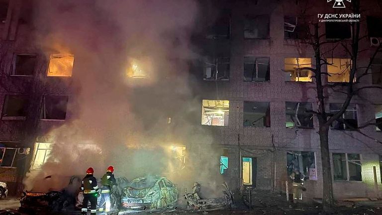Rescuers at the site of a residential building damaged during a Russian drone attack in Dnipro