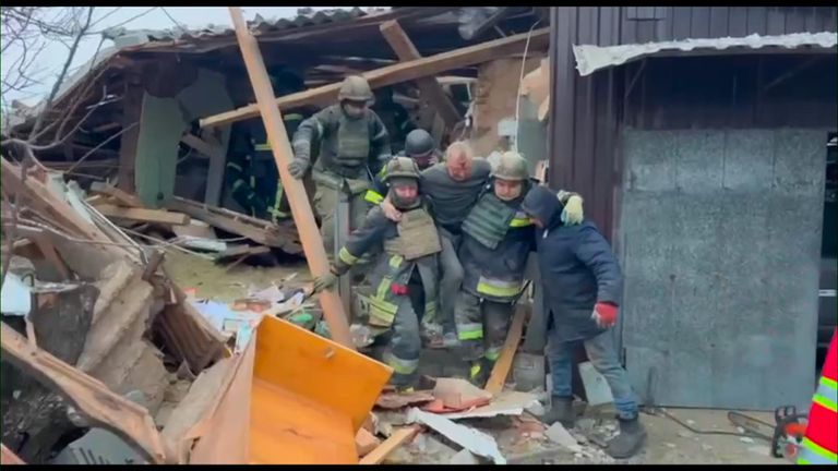 Injured Man Helped From Rubble in Kharkiv Oblast After Russian Barrage
