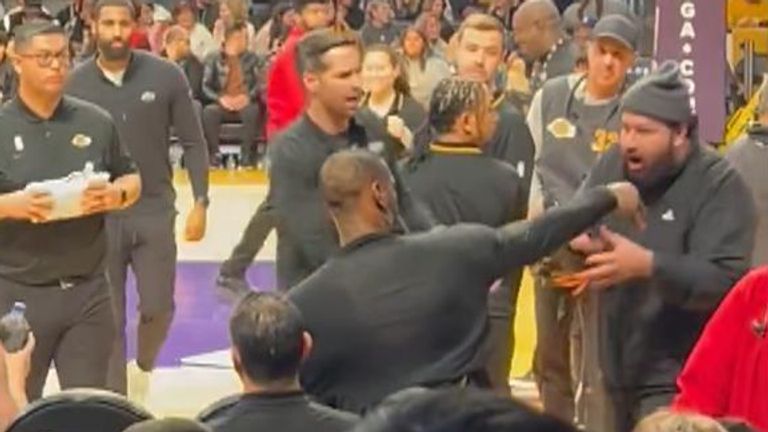 A man was escorted out of a Lakers game after a confrontation with LeBron James