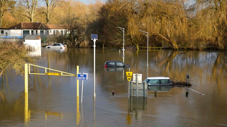 Cars in a flooded car park in Wallingford in Oxfordshire. Picture date: Tuesday January 9, 2024. PA Photo. See PA story WEATHER Cold. Photo credit should read: Andrew Matthews/PA Wire..