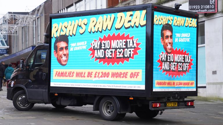 A van in Wellingborough, North Northamptonshire, displaying Labour&#39;s poster campaign of what it calls "Rishi&#39;s raw deal" for taxpayers ahead of the reduction in national insurance contributions on January 6. Picture date: Friday January 5, 2024.