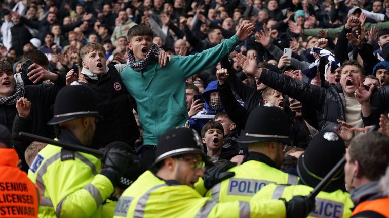 Fans invading the pitch clash with police officers during the Emirates FA Cup fourth round match at The Hawthorns, West Bromwich. Picture date: Sunday January 28, 2024.

