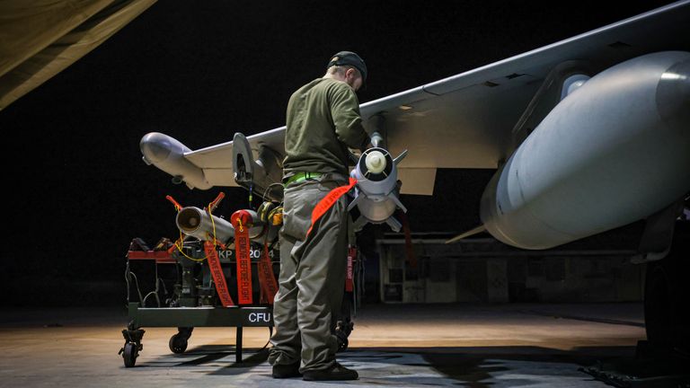 RAF Armourers (Weapon Technicians) prepare a Royal Air Force Typhoon FGR4 for Air Strikes against Houthi military targets in Yemen 
Pic: MOD
