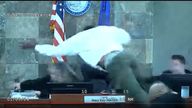 Debora Redden is seen in court footage leaping at a judge. Pic: AP