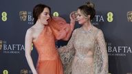 Emma Stone and Emily Blunt arrive at the 2024 British Academy of Film and Television Awards (BAFTA) at the Royal Festival Hall in the Southbank Centre, London, Britain, February 18, 2024. REUTERS/Isabel Infantes
