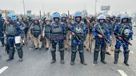 Police guard a major highway at Singhu near New Delhi to stop  of protesting farmers from entering the capital
Pic: AP