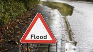 A flood warning sign in Dumbarton, West Dunbartonshire, as Scotland and northern parts of England are forecast to suffer extreme rainfall and flooding, whilst southern parts of the UK are set to bask in a late blast of summer over the weekend. The Met Office issued an amber weather warning for much of Scotland, and the Scottish Environmental Protection Agency (Sepa) warned against perceiving the situation as "normal autumn". Picture date: Saturday October 7, 2023.
