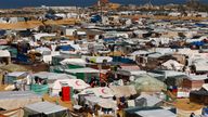 Displaced Palestinians, who fled their houses due to Israeli strikes, take shelter in a tent camp, amid the ongoing conflict between Israel and the Palestinian Islamist group Hamas, at the border with Egypt, in Rafah in the southern Gaza Strip, February 8, 2024. REUTERS/Ibraheem Abu Mustafa
