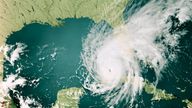 3D Render of a Topographic Map of the Gulf Of Mexico with the clouds from September 27, 2022. .Major Hurricane Ian approaching Florida, USA..All source data is in the public domain..Cloud texture: Global Imagery Browse Services (GIBS) courtesy of NASA, GOES data courtesy of NOAA..https://www.earthdata.nasa.gov/eosdis/science-system-description/eosdis-components/gibs.Color texture: Made with Natural Earth..http://www.naturalearthdata.com/downloads/10m-raster-data/10m-cross-blend-hypso/.Relief texture: GMTED 2010 data courtesy of USGS. URL of source image:.https://topotools.cr.usgs.gov/gmted_viewer/viewer.htm.Water texture: SRTM Water Body SWDB: https://dds.cr.usgs.gov/srtm/version2_1/SWBD/