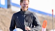 Prince Harry, Duke of Sussex reacts after taking a skeleton run.
Pic: Reuters