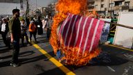 Demonstrators burn representations of the Israeli and U.S. flags during their annual rally commemorating Iran&#39;s 1979 Islamic Revolution. Pic: AP
