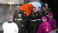 John Bruton&#39;s coffin was draped in the Irish flag for its final journey. Pic: Brian Lawless/PA Wire