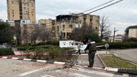 Israeli police work at the area where a rocket landed after it was fired from Lebanon in Kiryat Shmona.
Pic: Reuters