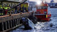 A car is retrieved from the water after driving out into the Oslofjord, in Oslo, Norway, Thursday Feb. 1, 2024. (Hakon Mosvold Larsen/NTB Scanpix via AP)