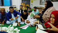 Polling officers count ballot papers.
Pic: Reuters