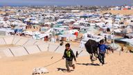 Displaced Palestinians take shelter in a tent camp in Rafah. Pic: Reuters