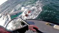 Four people being rescued after their fishing vessel sank off the west coast of Scotland
Pic:RNLI Oban HelmetCam/PA