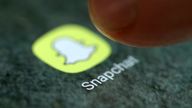 The Snapchat app logo is seen on a smartphone in this picture illustration taken September 15, 2017. REUTERS/Dado Ruvic/Illustration