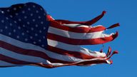 A tattered American flag flies over Bamberg, South Carolina, U.S., February 13, 2024. REUTERS/Julia Nikhinson