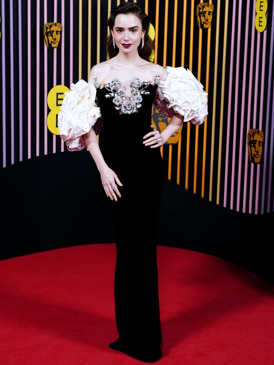 Lily Collins  in a blooming monochrome velvet gown. PA Wire