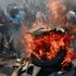 Protesters burn flags and target Western embassies in Democratic Republic of Congo