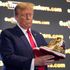 Trump promotes golden 'Never Surrender Hi-Top' trainers for $399 a pair