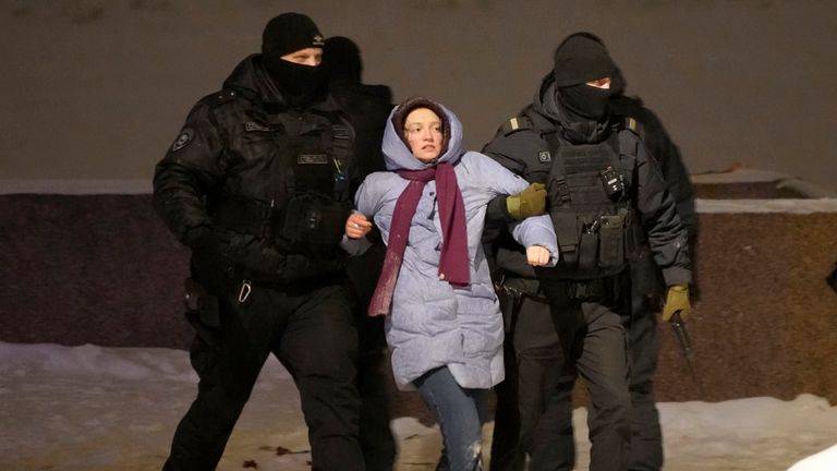 Police officers detain a woman who laid flowers for Alexei Navalny at the Memorial to Victims of Political Repression in St. Petersburg, Russia on Friday, Feb. 16, 2024. Russian authorities say that Alexei Navalny, the fiercest foe of Russian President Vladimir Putin who crusaded against official corruption and staged massive anti-Kremlin protests, died in prison. He was 47. (AP Photo)


