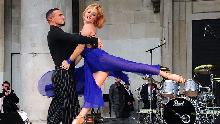 Aliona Vilani and Robin Windsor perform while selling Poppies in Covent Garden.
Pic: PA