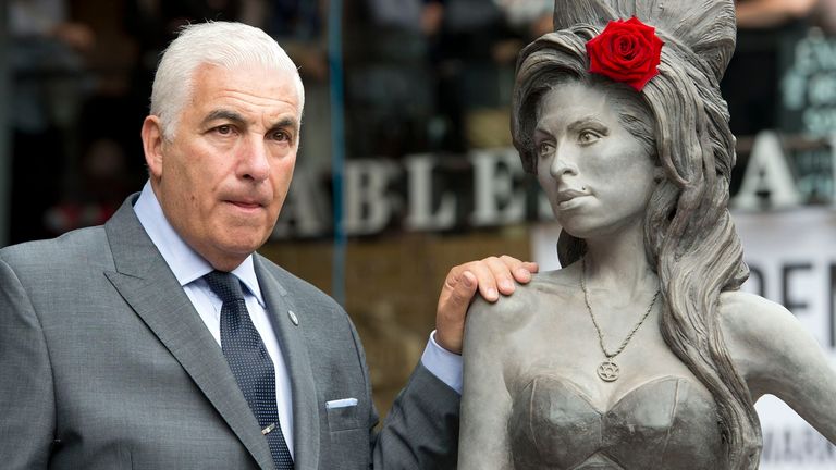 Amy Winehouse&#39;s father Mitchell Winehouse stands next to Amy&#39;s statue after it was unveiled at Stables Market, Camden Town, London. PRESS ASSOCIATION Photo. Picture date: Sunday September 14, 2014. See PA story  . Photo credit should read: Laura Lean/PA Wire