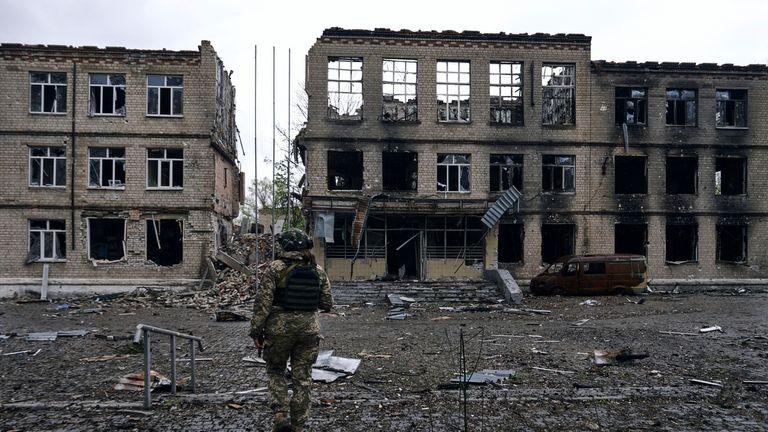 A Ukrainian soldier wals in Avdiivka, the site of heavy battles with Russian troops in the Donetsk region, Ukraine, Tuesday, April 25, 2023. (AP Photo/Libkos)