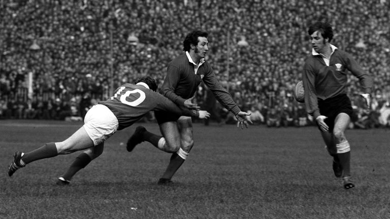 Ireland&#39;s Barry McGann tackling Gareth Edwards of Wales, with teammate Barry John to the right, during an international match at Cardiff in 1971 Pic: PA