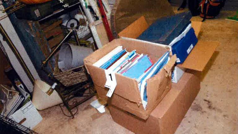 This image, contained in the report from special counsel Robert Hur, and marked with the number 1, shows a damaged box where classified documents were found in the garage of President Joe Biden in Wilmington, Del., during a search by the FBI on Dec. 21, 2022. (Justice Department via AP)