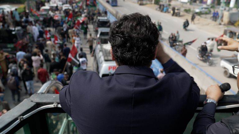 Bilawal Bhutto Zardari waves to those gathered on the streets