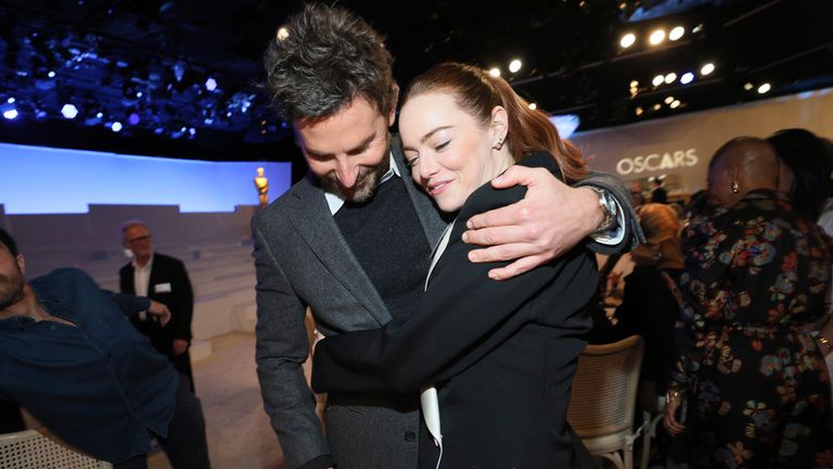 Bradley Cooper, left, and Emma Stone attend the 96th Academy Awards Oscar nominees luncheon on Monday, Feb. 12, 2024, at the Beverly Hilton Hotel in Beverly Hills, Calif. (Photo by Danny Moloshok/Invision/AP)