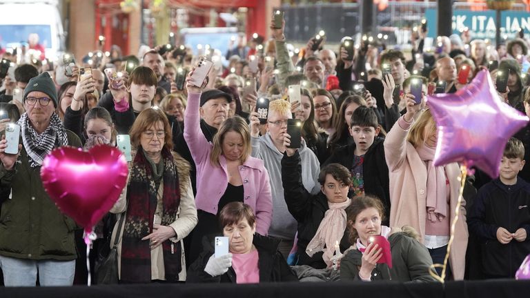 People holding their phones aloft during a two minutes silence at vigil in Golden Square, Warrington, to mark the first anniversary of the murder of 16-year-old Brianna Ghey. Picture date: Sunday February 11, 2024.

