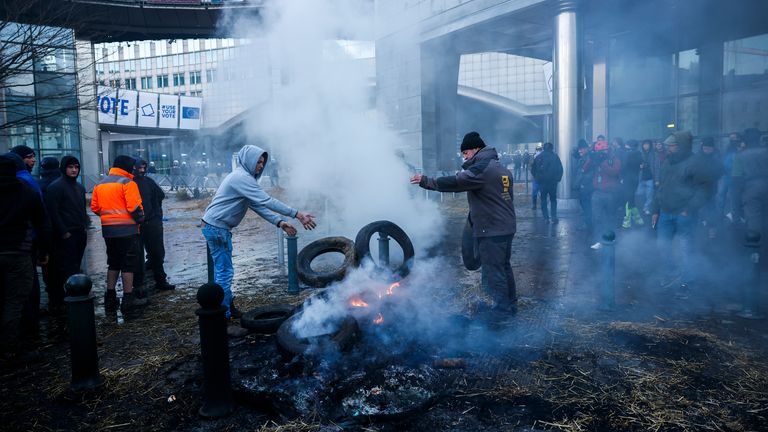 Pic: AP
People burn straw and tyres during a protest by farmers outside the European Parliament as European leaders meet for an EU summit in Brussels, Thursday, Feb. 1, 2024. European Union leaders meet in Brussels for a one day summit to discuss the revision of the Multiannual Financial Framework 2021-2027, including support for Ukraine. (AP Photo/Thomas Padilla)