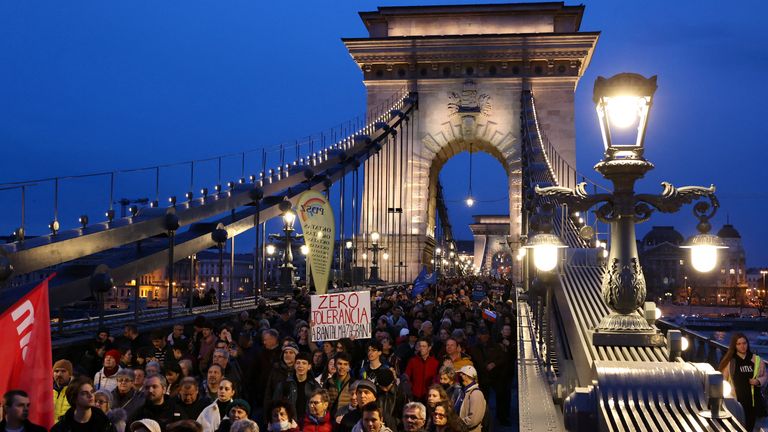 Protesters call for Ms Novak&#39;s resignation on the Chain Bridge in Budapest. Pic: Reuters