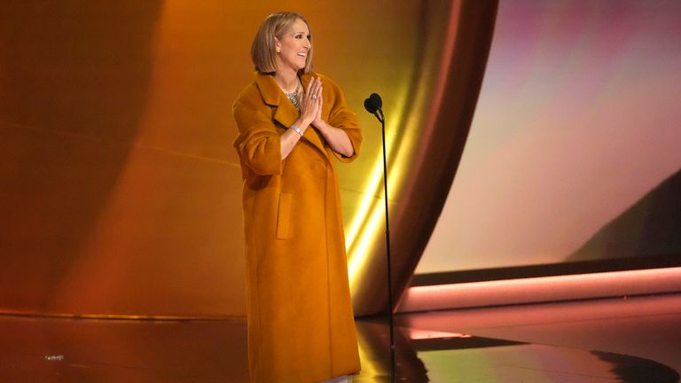 Celine Dion presents the award for album of the year during the 66th annual Grammy Awards on Sunday, Feb. 4, 2024, in Los Angeles. (AP Photo/Chris Pizzello)