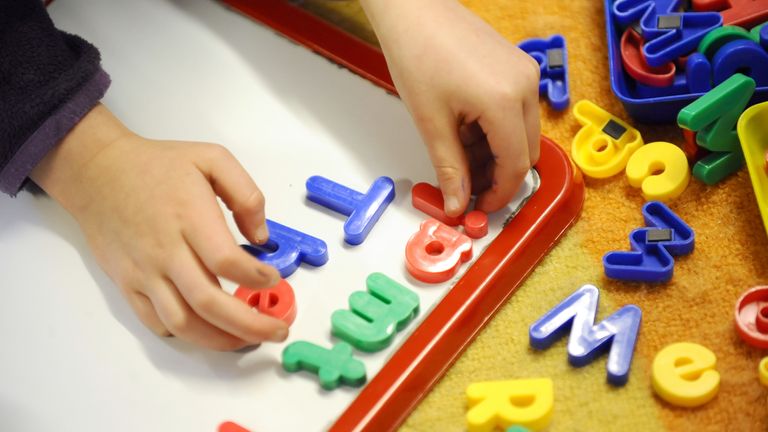 File photo dated 08/02/12 of a child playing, as parents can go online to find out what childcare they are eligible for under plans which will see nurseries expanded to provide more places and funding given to councils for wraparound care.