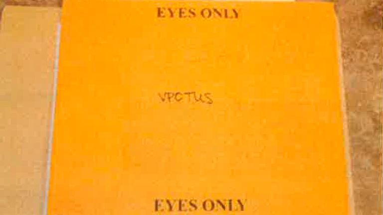 This image, contained in the report from special counsel Robert Hur, shows the envelope labeled "Eyes Only" with a handwritten note reading "VPOTUS," that contained classified documents that were found in Box 3 of documents housed at the Penn Biden Center in Washington. (Justice Department via AP)