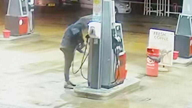 Individual alleged to be Constance Marten is seen on CCTV filling a bottle at a petrol pump