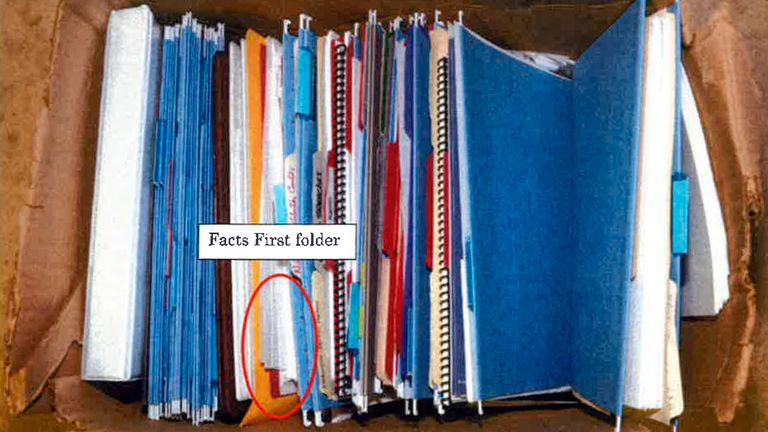 This image, contained in the report from special counsel Robert Hur, shows a box of files, found in the garage of President Joe Biden and annotating the "Facts First folder" where classified documents relating to Afghanistan were found in Wilmington, Del., during a search by the FBI on Dec. 21, 2022. (Justice Department via AP)