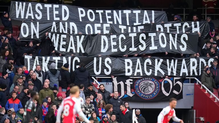 Crystal Palace fans hold a banner on the stands during the Premier League match at Emirates Stadium in London, Saturday, Jan. 20, 2024.  Pic: AP 
