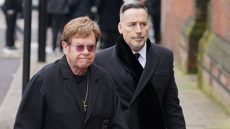 Pic: PA
Sir Elton John and his partner David Furnish attending the funeral service of Derek Draper at St Mary the Virgin church in Primrose Hill, north west London. The former lobbyist turned psychologist and author, who married presenter Kate Garraway in 2005, died last month following long-lasting symptoms from coronavirus. Picture date: Friday February 2, 2024