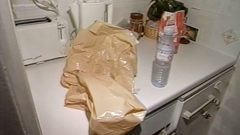 Brown plastic bag in kitchen
Pic: Met Police