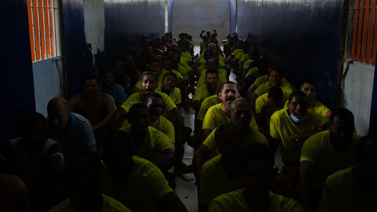 Inmates chant inside a prison in Esmeraldas