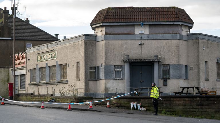 Floral tributes left close to the scene near the Anchor Inn in Granton, Edinburgh, where Marc Webley, aged 38, was killed in a shooting just before midnight on New Year&#39;s Eve. Picture date: Wednesday January 3, 2024.